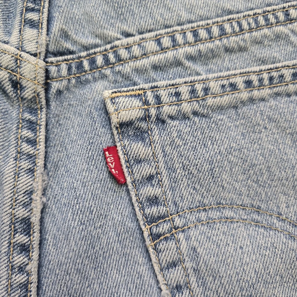 Vintage Levi's 519 Women's Light Wash Blue Denim Cutoff Shorts - Picture 3 of 14